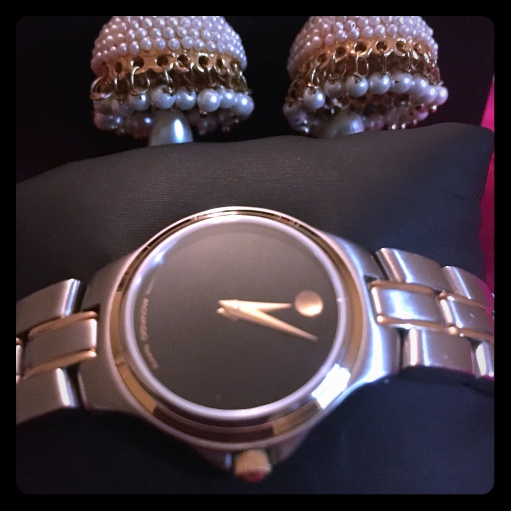 Movado beautiful watch with black dial.